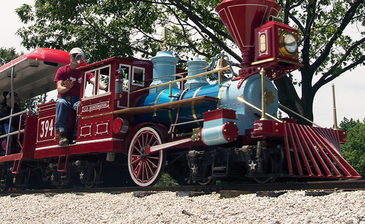 Miniature train with passengers at Blackberry Farm